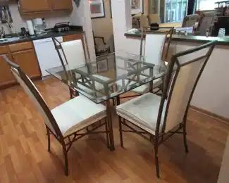 Glass top table and 4 chairs