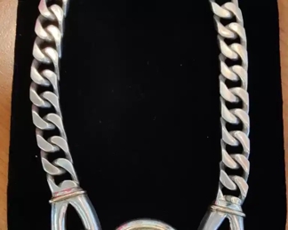 Sterling curb chain necklace with amethyst and gold overlay.