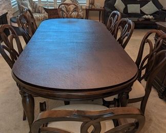 Hooker dinning table with eight chairs and custom cover pads 