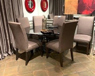 Iron base, glass top dining table and 6 chairs