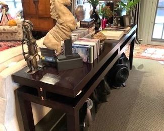 Sofa table, CDs, DVDs, sculpture