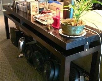Electric fans and heaters under the sofa table