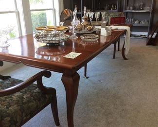 beautiful hand made table. extends to seat 10-12 people