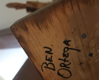 signature on  statue-  Ben  Ortega
