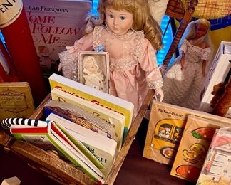 Dolls, books, puzzles and games. 