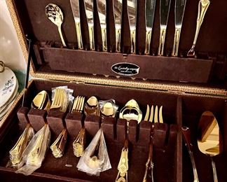 Three sets of gold plated flatware!!