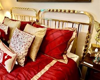 Two twin brass headboards with a King tempurpedic mattress. Selling headboards separately.  