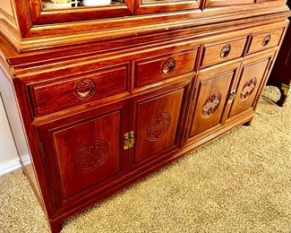 Nice Asian details on the china hutch. 
