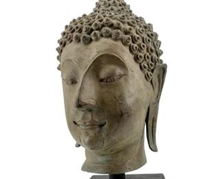 Old Bronze Buddha Head on Wooden Stand
