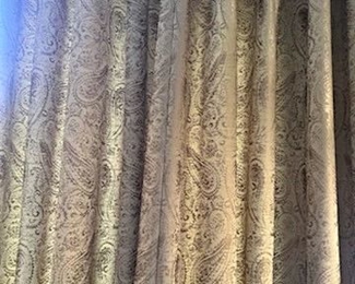 Drapes in the living room and dining room