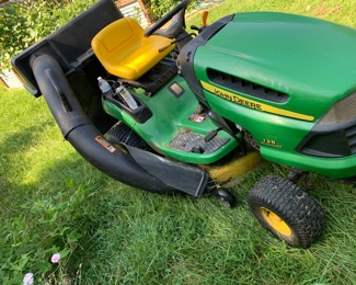 John Deere tractor mower with bagger system 