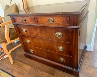 Mahogany cabinet that folds out into a large table 