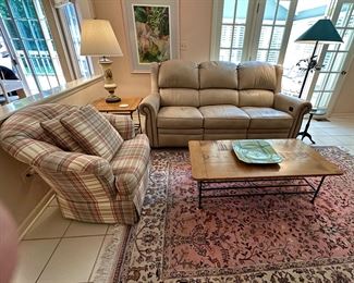 Beautiful Family Room including Leather Recliner Sofa from Walter E. Smith, Samsung UHD 55" TV, Occasional Tables by Charleston Forge, 
