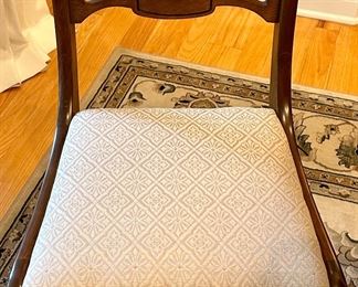 Duncan Phyfe 1930's Dining Table with 3 Leaves and Custom pads.  Total of 6 Dining Chairs with One Armed Chair. The Table has 2 Pedestals.  60" L x 40" W with 3 10" Leaves. 