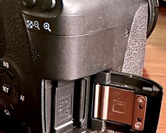 Canon EOS Rebel T2i DSLR Camera with Canon 18-55mm Lens. Includes 2 Batteries, Battery Charger and the Canon DSLR Camera Bag