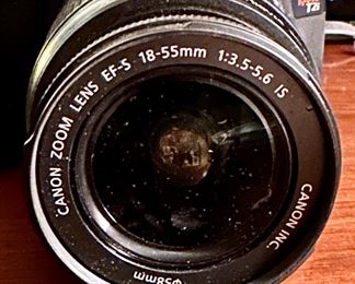 Canon EOS Rebel T2i DSLR Camera with Canon 18-55mm Lens. Includes 2 Batteries, Battery Charger and the Canon DSLR Camera Bag