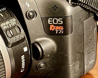 Canon EOS Rebel T2i DSLR Camera with Canon 18-55mm Lens. Includes 2 Batteries, Battery Charger and the Canon DSLR Camera Bag
