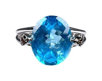 14kt White Gold Blue Topaz and Diamond Ring