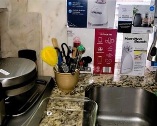 Kitchen: casseroles, utensils, cutting boards. Appliances: blender, smoothie maker, can opener , chopper