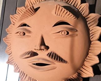 Large terra cotta sun