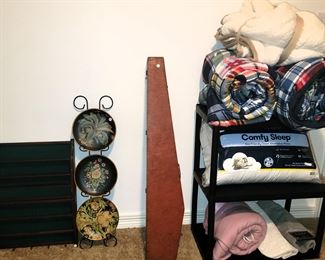 Linens, blankets, comforters, table covers.  Golf ball display