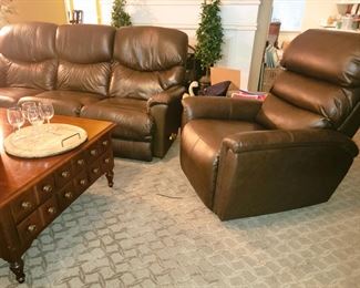 Leather Reclining sofa, electric recliner chair. Square wood coffee table