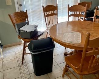 Wooden round table and 6 chairs