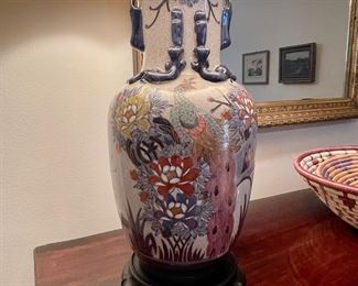 Stunning Hand Painted Chinese Porcelain peacock lamp on wood base.