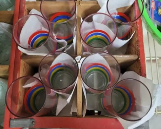 Vintage Coca-Cola glasses and Coke bottling crate.