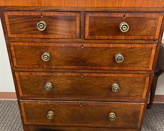 mahogany veneered chest of drawers