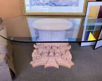 Large oval glass top table with terra cotta base