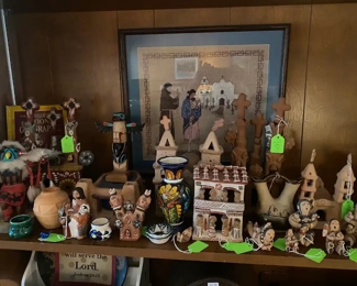 Artwork from New Mexico and Mexico. Terra Cotta churches, Story Teller figurines made by Juanita from New Mexico, Talavera Pottery