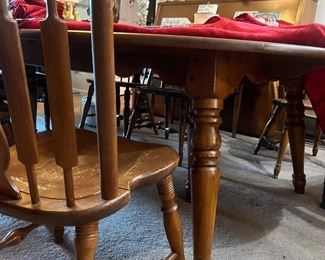 Antique dining table with two leaves and six chairs