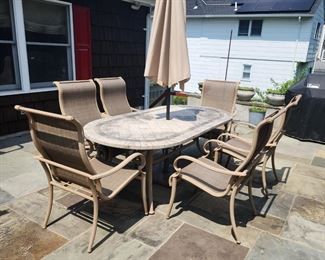 OUTDOOR PATIO SET WITH UMBRELLA AND SEATS BY SUNBRELLA