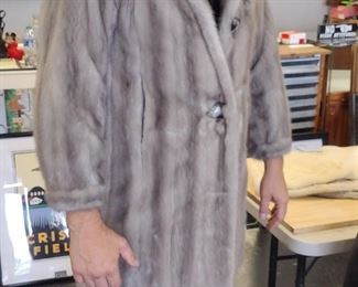silver mink fur coat model by nonprofessional