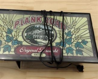 playing road brewery light up advertisement