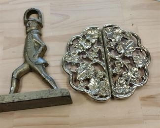 brass doorstop and trivet