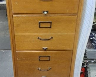 Vintage four door wood filing cabinet