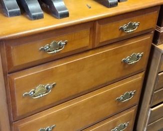Chest of drawers and nesting tables on top