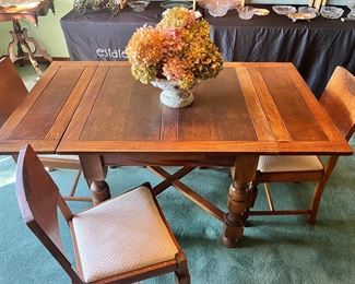 English Antique Draw Leaf Oak Table with four chairs