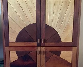 Hand carved trastero by Sam Quintana