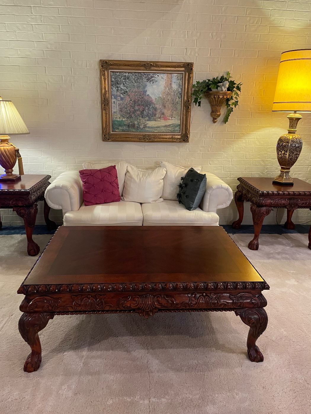 Lovely living room sofa, coffee table and matching end tables 
