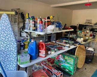 Garage full of tools, cleaning supplies and pet items 