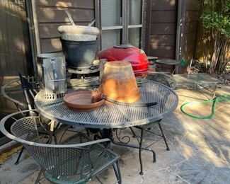 Wrought iron patio dining set and matching side chairs 