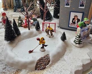 Dept 56 Village Series Village Animated Hockey Player