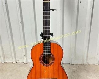 Yamaha guitar with stand and case