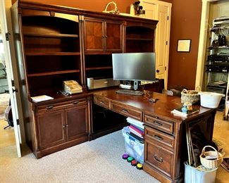Partners desk, comes apart into 5 sections. Very heavy and sturdy. Purchased from Costco. $900 There are a few marks on the main desk but in nice condition with lighted bookshelves and some glass shelves, power strip in base $900