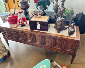 Coffee table or can be used for TV, storage space all inside and top is marble. MCM $225