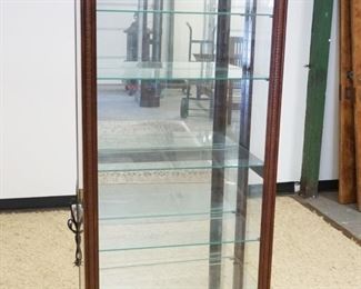 1029	NARROW HOWARD MILLER CURIO CRYSTAL CABINET W/INTERIOR LIGHTING & ADJUSTABLE GLASS SHELVES & MIRROR BACK, APPROXIMATELY 27 IN X 13 IN X 76 IN HIGH

