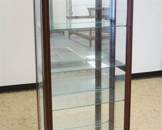 1030	NARROW HOWARD MILLER CURIO CRYSTAL CABINET W/INTERIOR LIGHTING & ADJUSTABLE GLASS SHELVES & MIRROR BACK, APPROXIMATELY 27 IN X 13 IN X 76 IN HIGH
